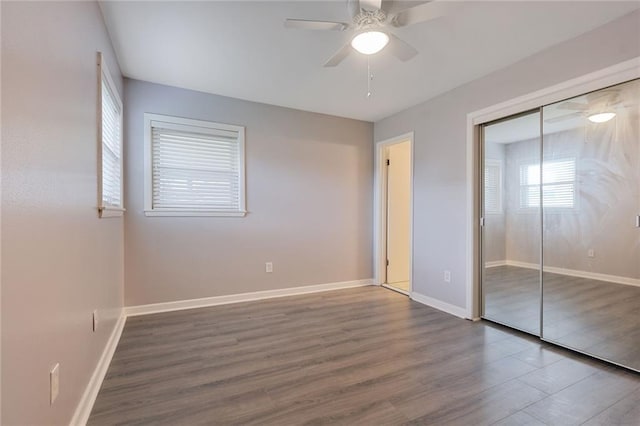 5908 York St, Metairie, LA 70003 - unfurnished bedroom featuring wood finished floors, baseboards, a closet, and ceiling fan