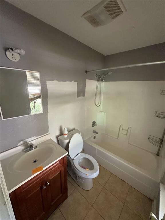 2216 Teal St, Slidell, LA 70460 - full bathroom with toilet, bathtub / shower combination, tile patterned floors, and vanity