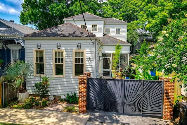 1126 Toledano St, New Orleans, LA 70115 - view of front of house with a shingled roof