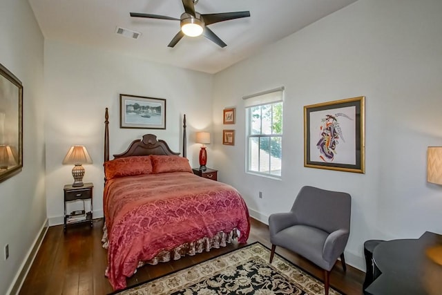 1126 Toledano St, New Orleans, LA 70115 - bedroom featuring dark wood-style floors, baseboards, and a ceiling fan