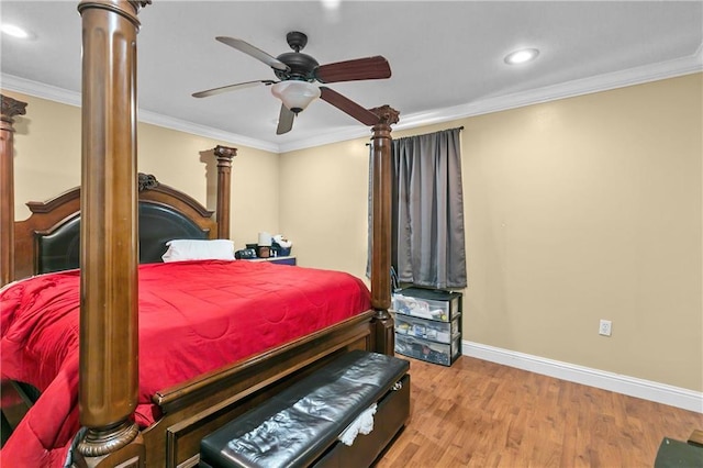 7542 Lehigh St, New Orleans, LA 70127 - bedroom with decorative columns, wood finished floors, baseboards, ornamental molding, and recessed lighting