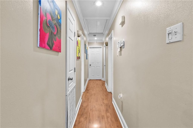 7542 Lehigh St, New Orleans, LA 70127 - hall with attic access, ornamental molding, light wood-type flooring, baseboards, and recessed lighting