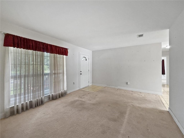 34159 Tupelo Ln, Slidell, LA 70460 - unfurnished room with light colored carpet and baseboards