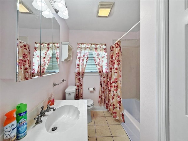 34159 Tupelo Ln, Slidell, LA 70460 - bathroom featuring toilet, tile patterned flooring, shower / bathtub combination with curtain, and vanity