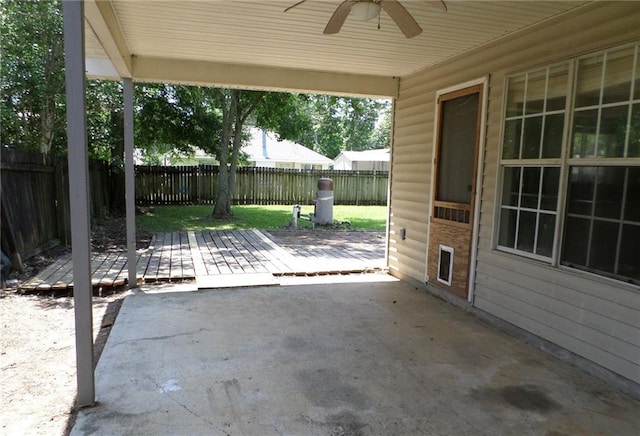 70305 I St, Covington, LA 70433 - fenced backyard with a ceiling fan and a patio area