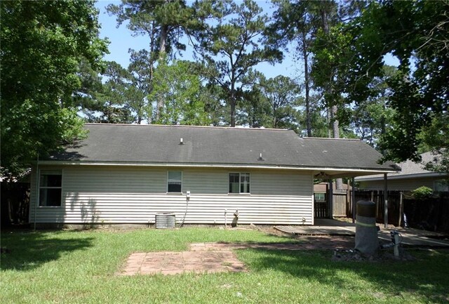 70305 I St, Covington, LA 70433 - rear view of property featuring a patio and central AC