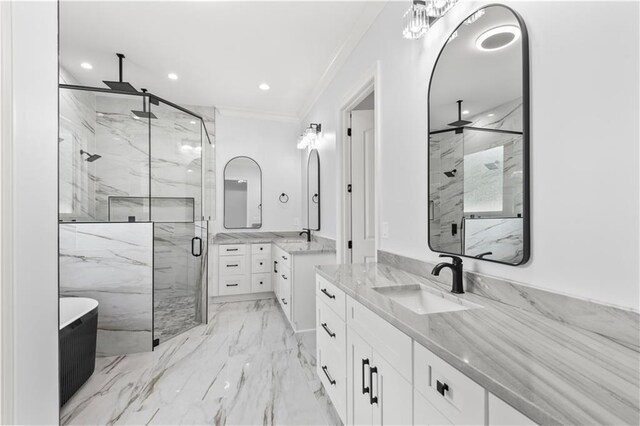 8925 25th St, Metairie, LA 70003 - full bath with a marble finish shower, ornamental molding, two vanities, a freestanding bath, and recessed lighting