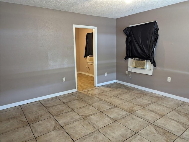 3127 Effie St, Slidell, LA 70458 - tiled spare room with a textured ceiling and cooling unit