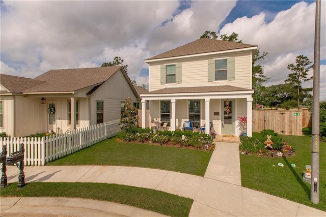 2329 Bradbury Pl, Covington, LA 70433 - american foursquare style home featuring covered porch and roof with shingles