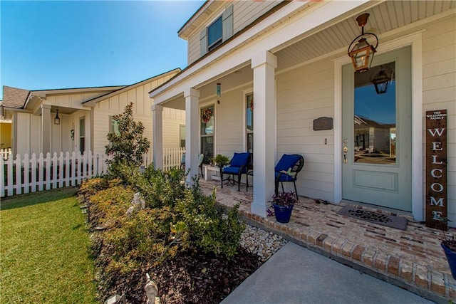 2329 Bradbury Pl, Covington, LA 70433 - property entrance featuring a porch and board and batten siding
