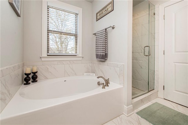 2329 Bradbury Pl, Covington, LA 70433 - full bath with marble look tile flooring, a garden tub, and a stall shower