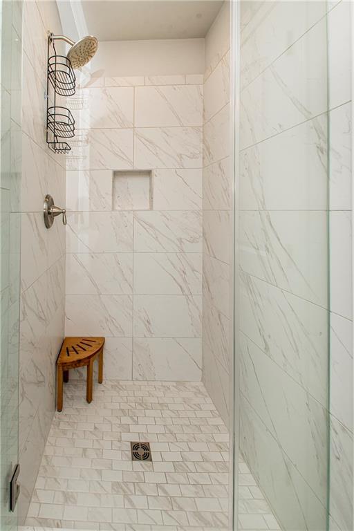 2329 Bradbury Pl, Covington, LA 70433 - bathroom featuring a stall shower