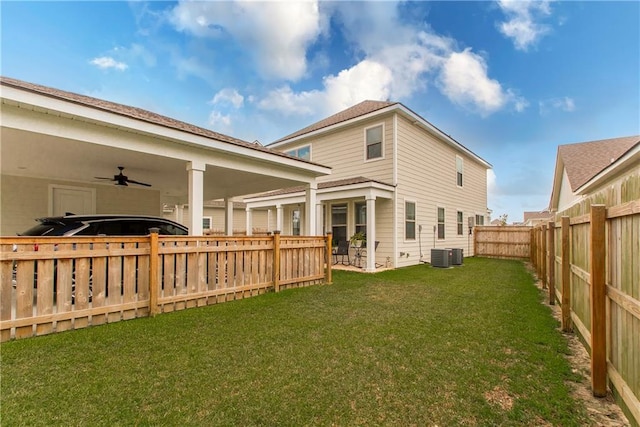 2329 Bradbury Pl, Covington, LA 70433 - rear view of house with a ceiling fan and a fenced backyard