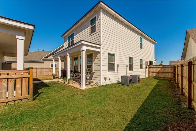 2329 Bradbury Pl, Covington, LA 70433 - back of property with a fenced backyard and a patio