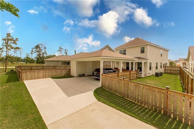 2329 Bradbury Pl, Covington, LA 70433 - rear view of house featuring concrete driveway
