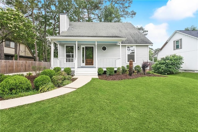 625 Woodridge Blvd, Mandeville, LA 70471 - view of front of property featuring a porch, a chimney, and roof with shingles