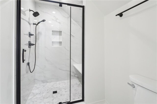 625 Woodridge Blvd, Mandeville, LA 70471 - full bath featuring toilet and a marble finish shower