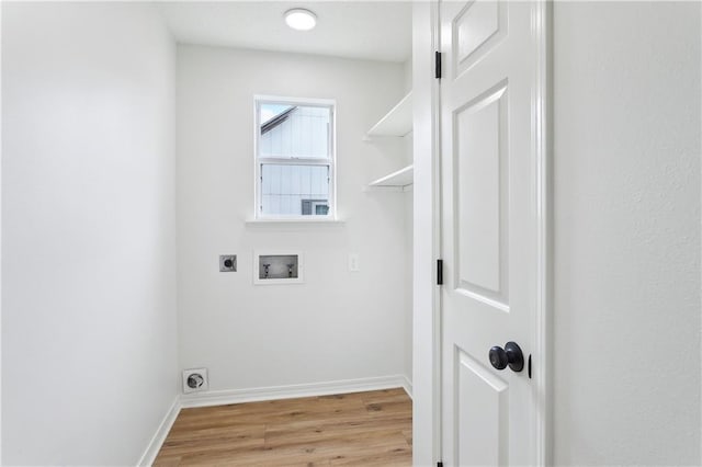625 Woodridge Blvd, Mandeville, LA 70471 - laundry room featuring electric dryer hookup, hookup for a washing machine, light wood-style floors, and baseboards