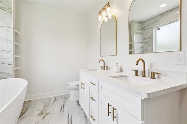 7211 Claiborne Ct, Arabi, LA 70032 - full bath with a freestanding bath, double vanity, marble finish floors, baseboards, and toilet