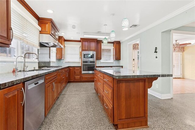 547 Jewel St, New Orleans, LA 70124 - kitchen with appliances with stainless steel finishes, a kitchen island, a sink, tasteful backsplash, and ornamental molding