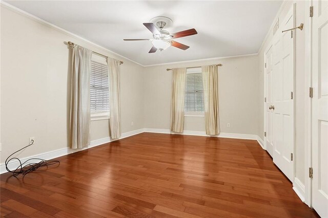 547 Jewel St, New Orleans, LA 70124 - unfurnished bedroom featuring wood finished floors, baseboards, ornamental molding, and a ceiling fan