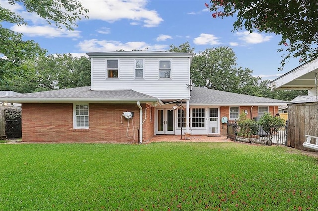 547 Jewel St, New Orleans, LA 70124 - rear view of property featuring french doors, brick siding, and roof with shingles