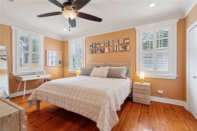 5930 Memphis St, New Orleans, LA 70124 - bedroom with baseboards, hardwood / wood-style floors, multiple windows, recessed lighting, and ceiling fan