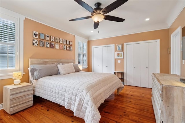 5930 Memphis St, New Orleans, LA 70124 - bedroom with multiple closets, hardwood / wood-style flooring, recessed lighting, a ceiling fan, and ornamental molding