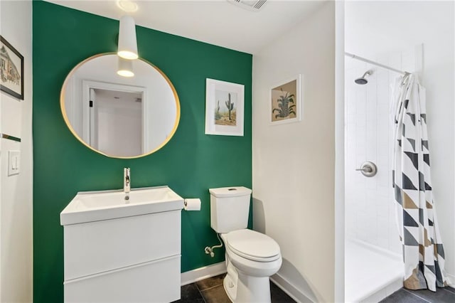 5930 Memphis St, New Orleans, LA 70124 - full bath with vanity, toilet, tiled shower, and tile patterned floors