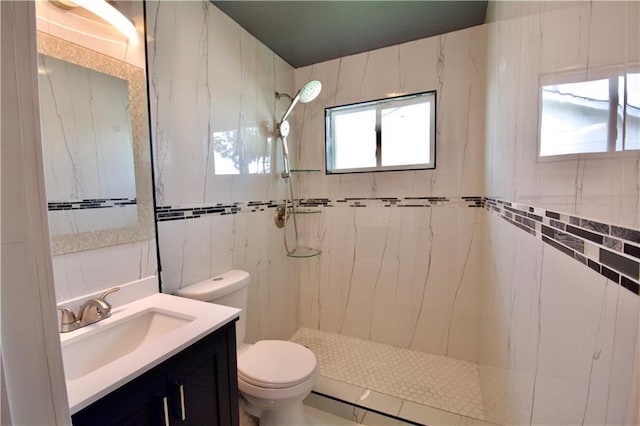 213 Travis Dr, Westwego, LA 70094 - bathroom featuring vanity, toilet, and a marble finish shower