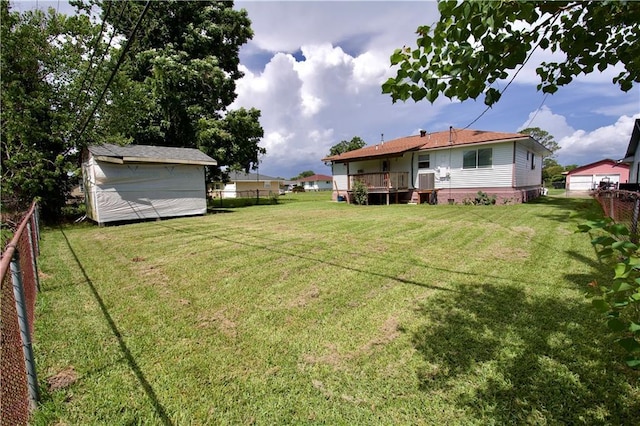 213 Travis Dr, Westwego, LA 70094 - view of yard with a wooden deck
