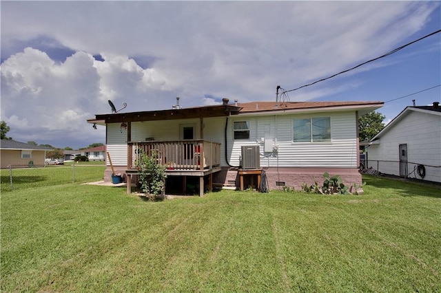 213 Travis Dr, Westwego, LA 70094 - back of property featuring a deck and central AC