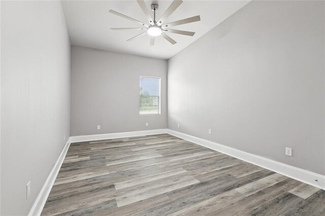 1400 Woodland Hwy, Belle Chasse, LA 70037 - unfurnished room with wood finished floors, a ceiling fan, and baseboards