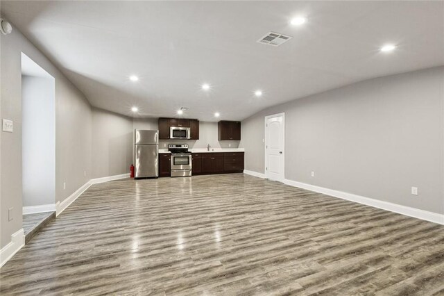 1400 Woodland Hwy, Belle Chasse, LA 70037 - unfurnished living room with wood finished floors, recessed lighting, and baseboards