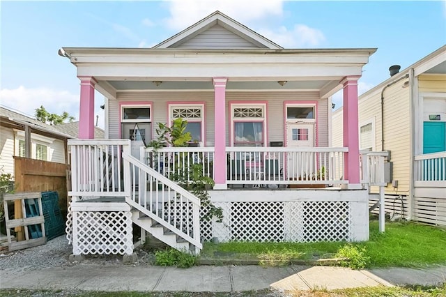 2754 Saint Ann St, New Orleans, LA 70119 - shotgun-style home with a porch