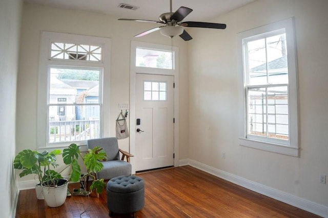 2754 Saint Ann St, New Orleans, LA 70119 - entrance foyer with wood finished floors and a ceiling fan
