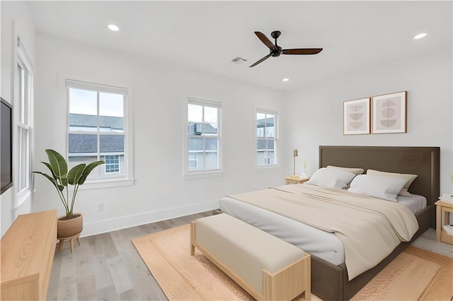 2509 Palmyra St, New Orleans, LA 70119 - bedroom with light wood-style flooring, recessed lighting, and ceiling fan