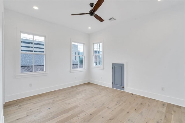 2509 Palmyra St, New Orleans, LA 70119 - spare room with light wood-style floors, ceiling fan, and recessed lighting