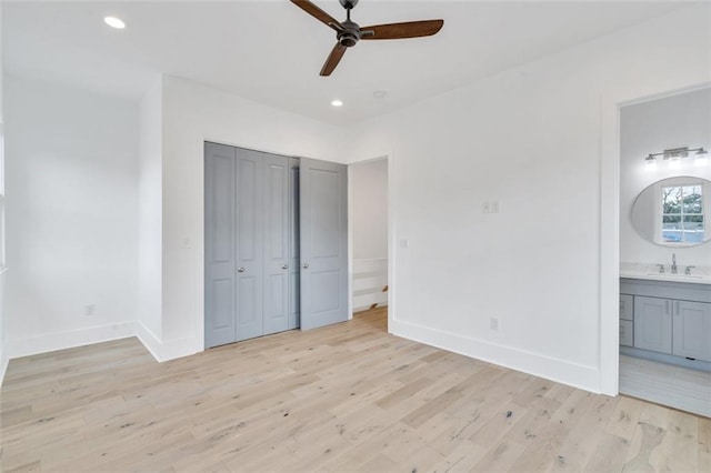 2509 Palmyra St, New Orleans, LA 70119 - unfurnished bedroom with light wood-style flooring, recessed lighting, ensuite bath, a closet, and ceiling fan