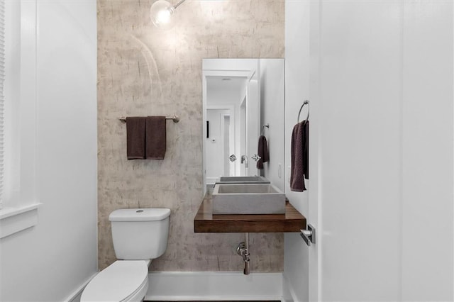 2316 Onzaga St, New Orleans, LA 70117 - half bath with toilet and a sink