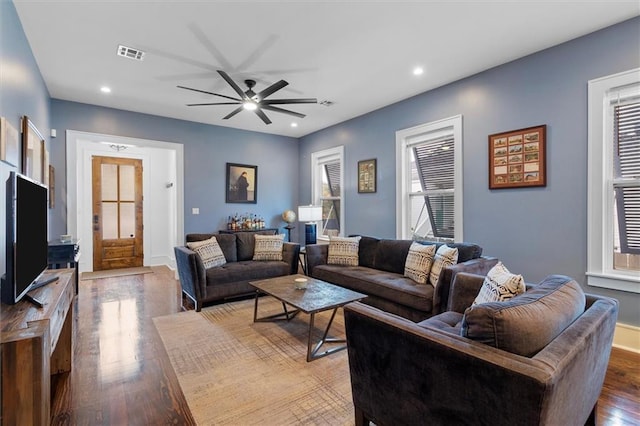 2316 Onzaga St, New Orleans, LA 70117 - living area featuring dark wood-style floors, ceiling fan, and recessed lighting