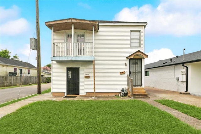 3500 Clematis St, New Orleans, LA 70123 - back of property with entry steps and a balcony