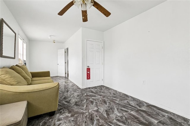 3500 Clematis St, New Orleans, LA 70123 - living area featuring ceiling fan and marble look tile flooring