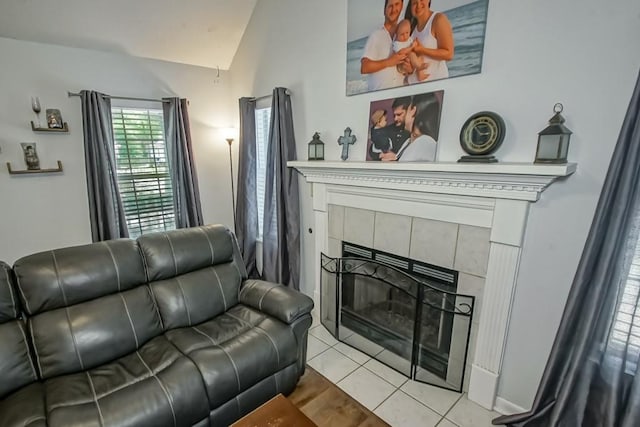 70380 K St, Covington, LA 70433 - living area featuring vaulted ceiling and a fireplace