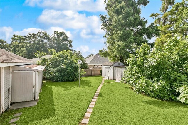 175 Dunleith Dr, Destrehan, LA 70047 - fenced backyard with a shed