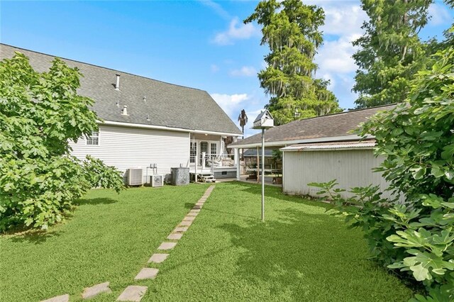 175 Dunleith Dr, Destrehan, LA 70047 - view of green lawn featuring a wooden deck