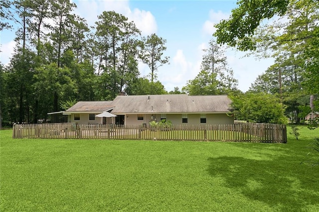 20226 Chandler Dr, Covington, LA 70435 - rear view of house featuring a fenced front yard