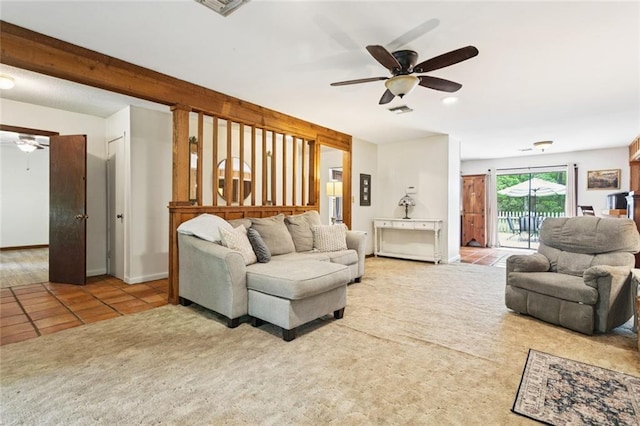 20226 Chandler Dr, Covington, LA 70435 - carpeted living room featuring a ceiling fan and tile patterned floors