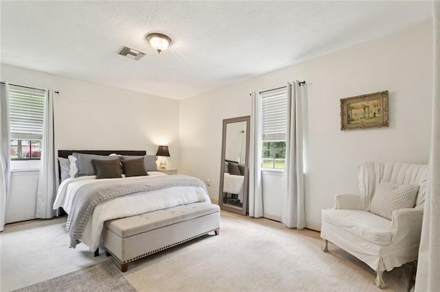20226 Chandler Dr, Covington, LA 70435 - bedroom featuring light colored carpet