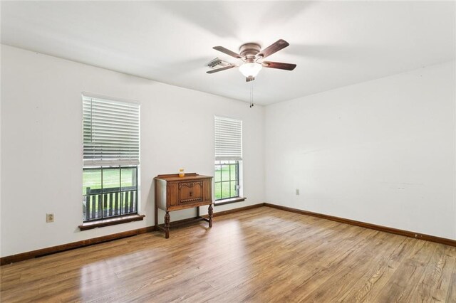 20226 Chandler Dr, Covington, LA 70435 - spare room with wood finished floors and a ceiling fan
